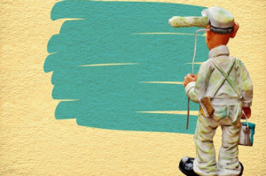 man painting a wall 
